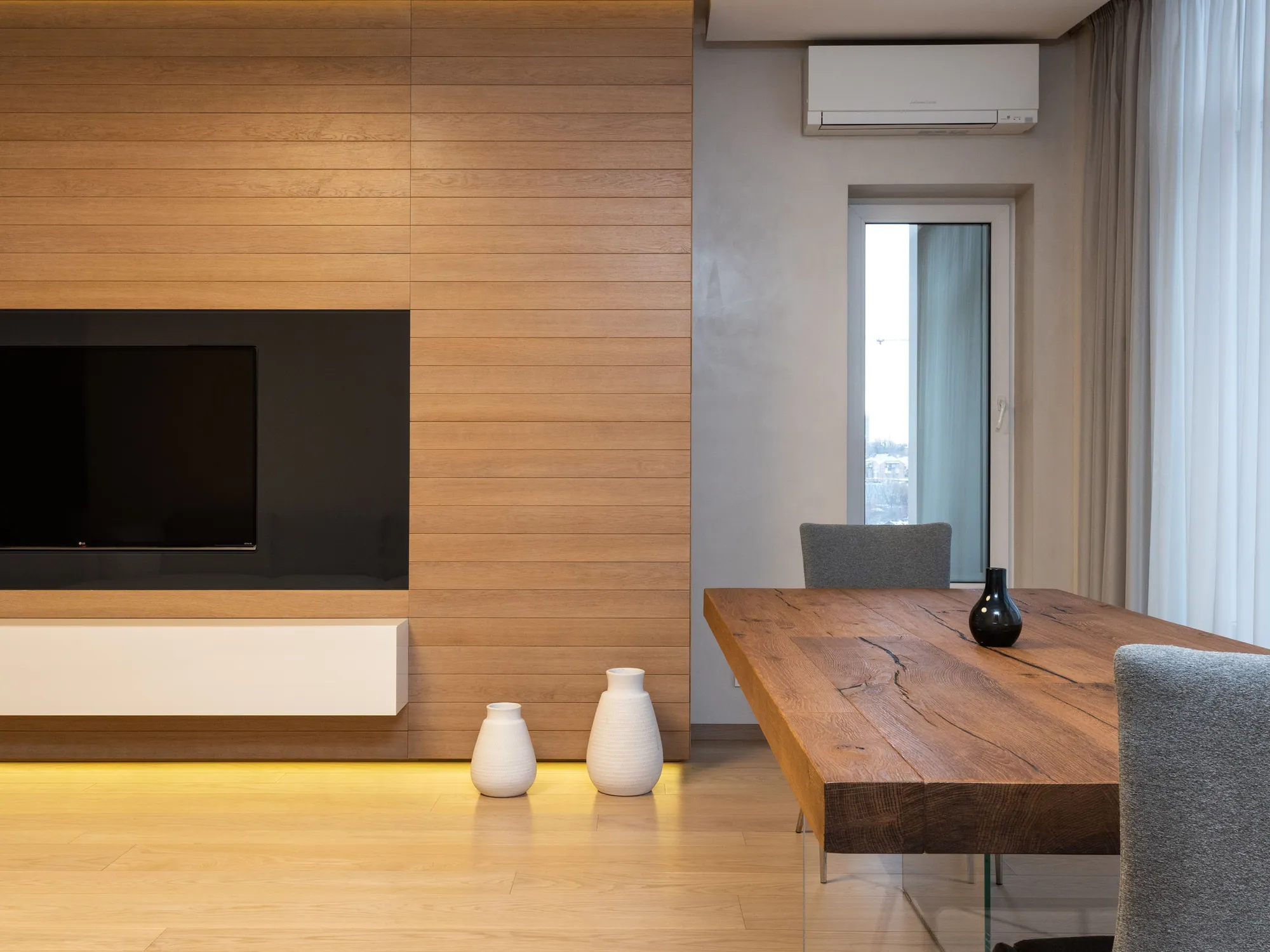 Living room with TV wall — design inspiration